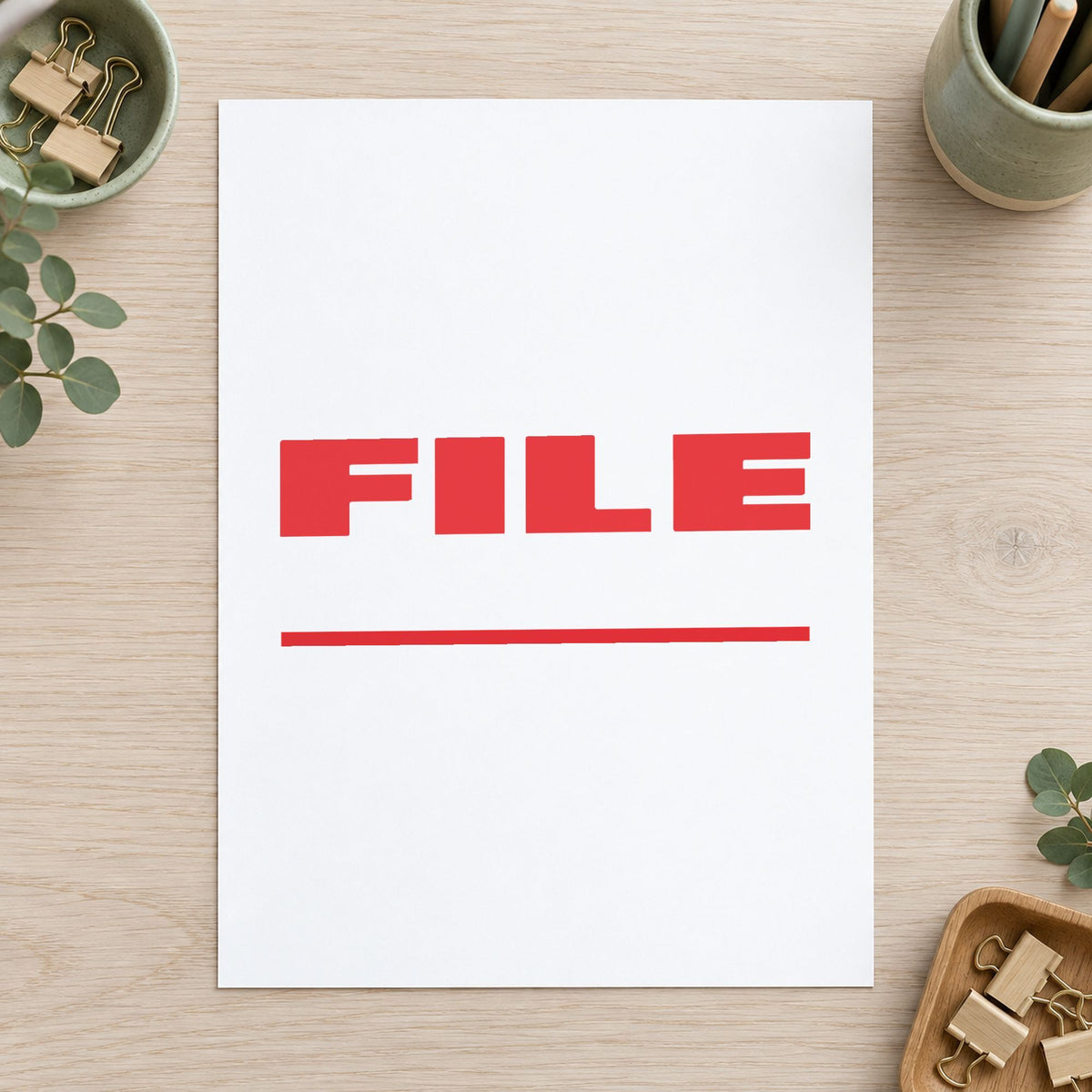 "File" Xstamper pre-inked stamp beside its rectangle imprint