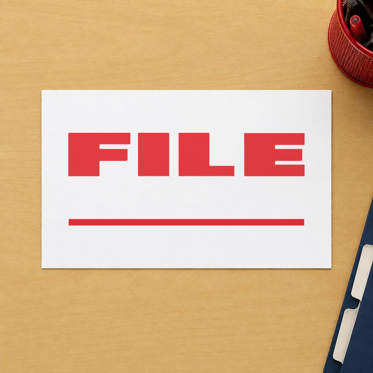 Pre-inked "File" stamp marking paperwork in an office setting