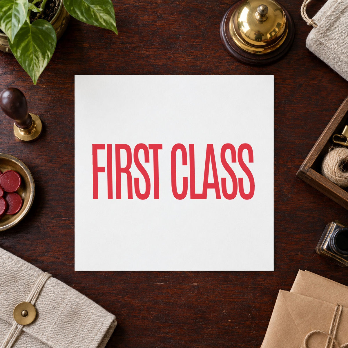 "First class" stamp pressed on paper, no separate ink pad needed