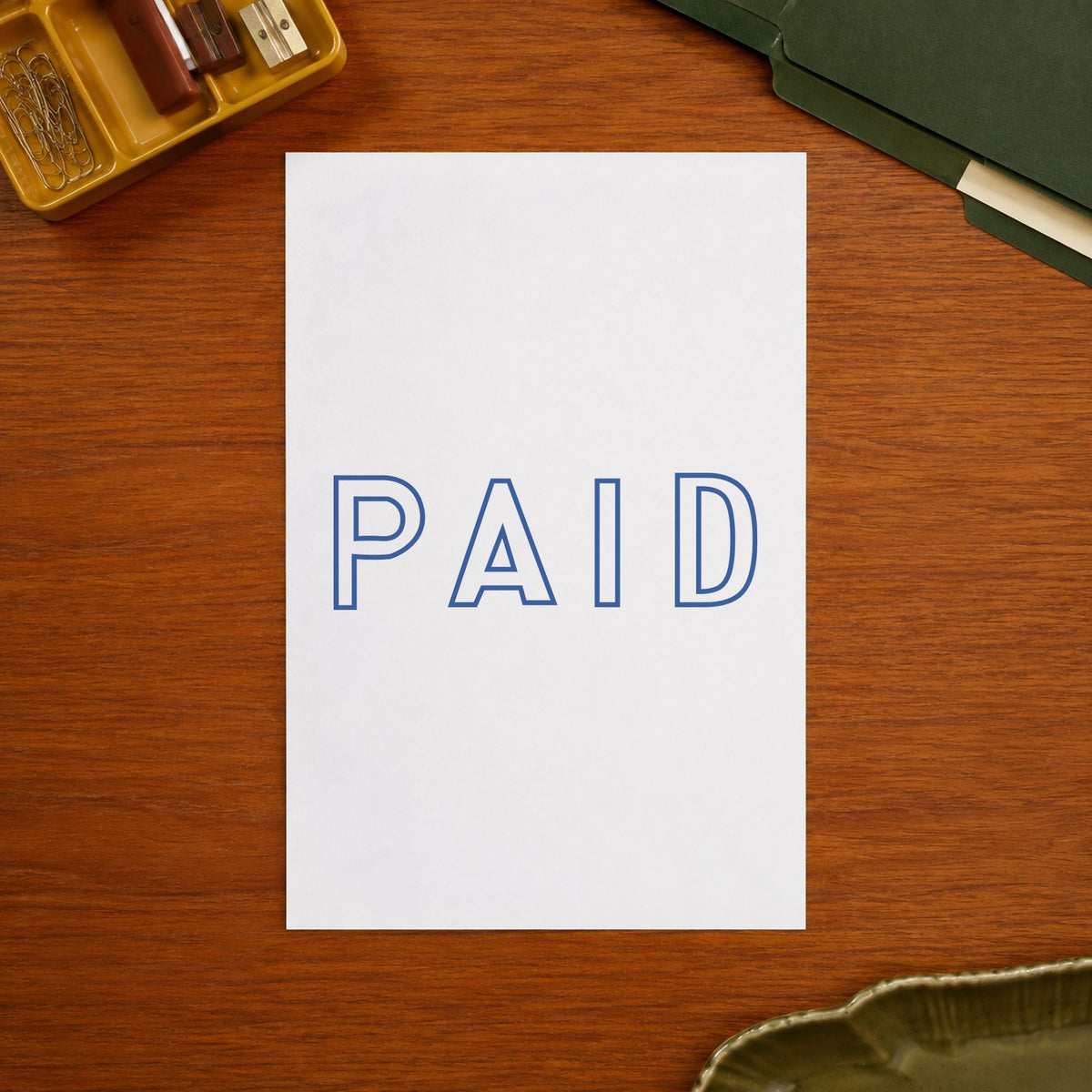 "Paid" imprint sized Approximately 1/2 in tall x 1-5/8 in wide on a document page