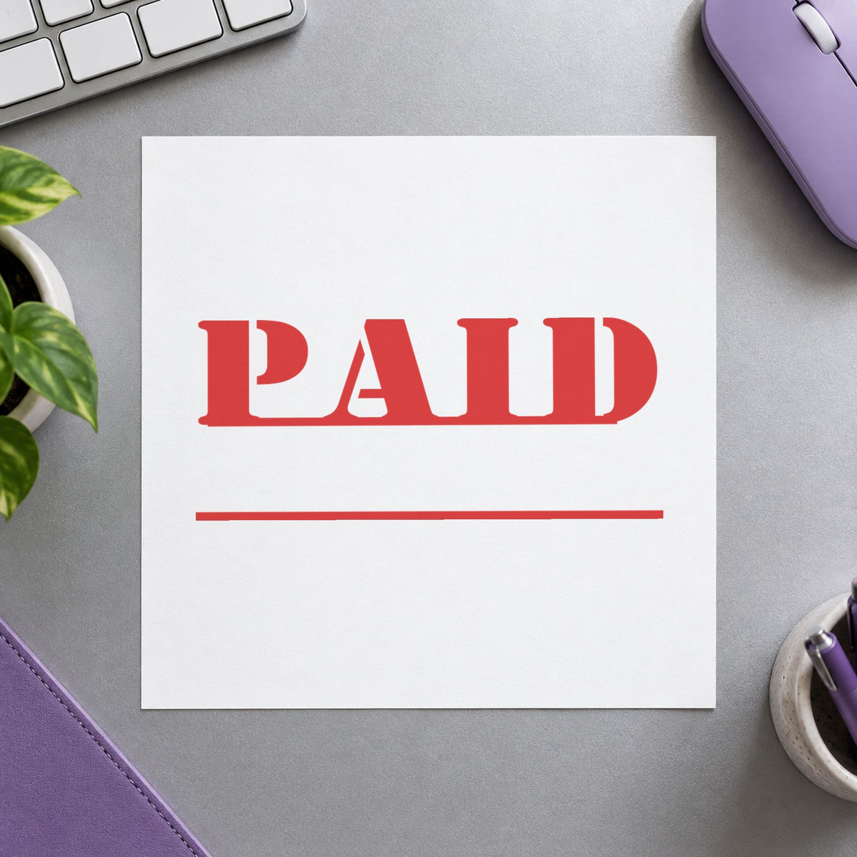"Paid" stamp pressed on paper, no separate ink pad needed