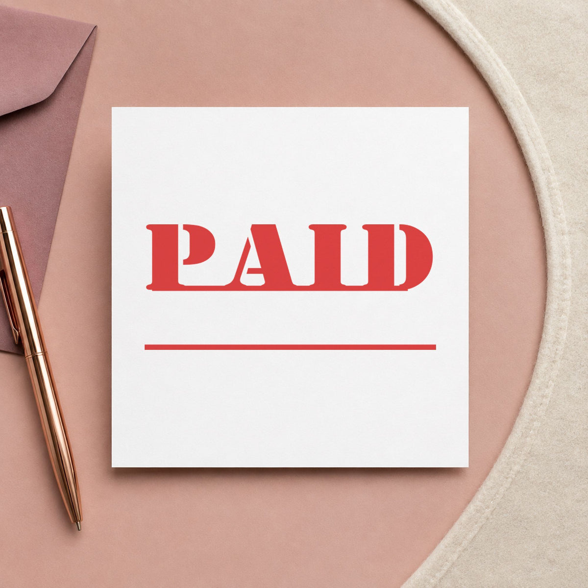 Pre-inked "Paid" stamp marking paperwork in an office setting