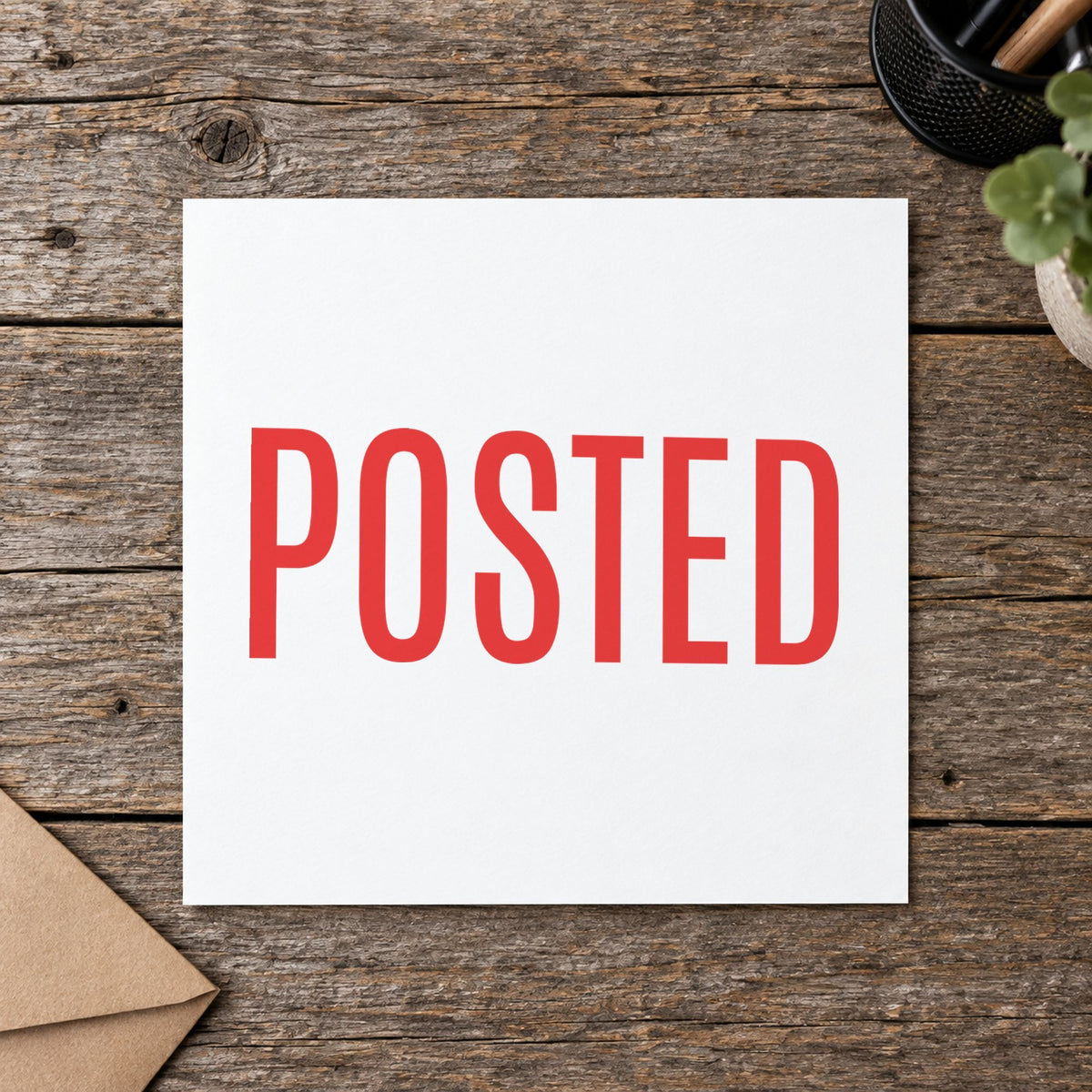 "Posted" stamp pressed on paper, no separate ink pad needed