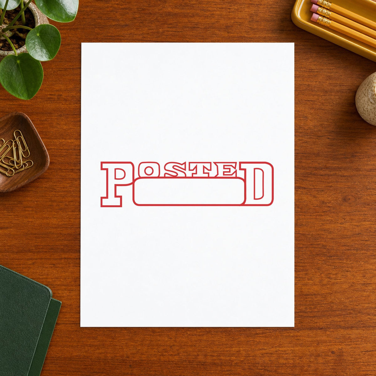 "Date posted" Xstamper pre-inked stamp beside its rectangle imprint