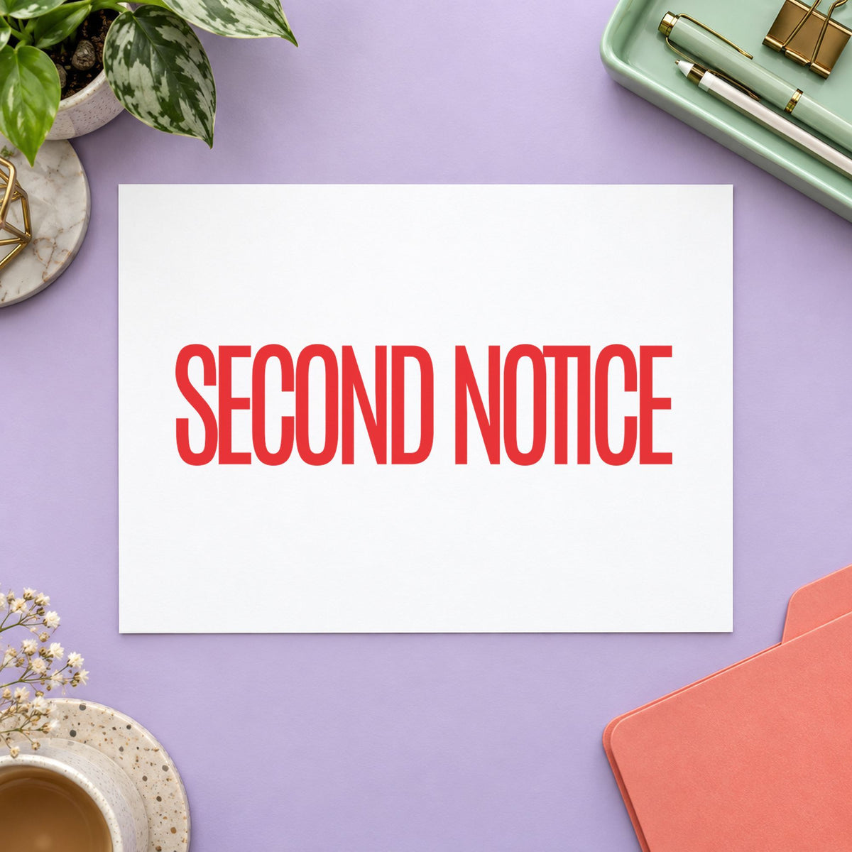 "Second notice" Xstamper stamp in use on paper, 1/2 x 1-5/8 in rectangle imprint