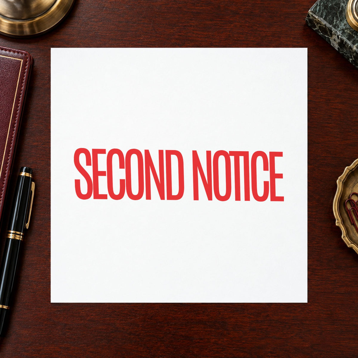 "Second notice" Xstamper No. 1012 stamp shown in everyday handling