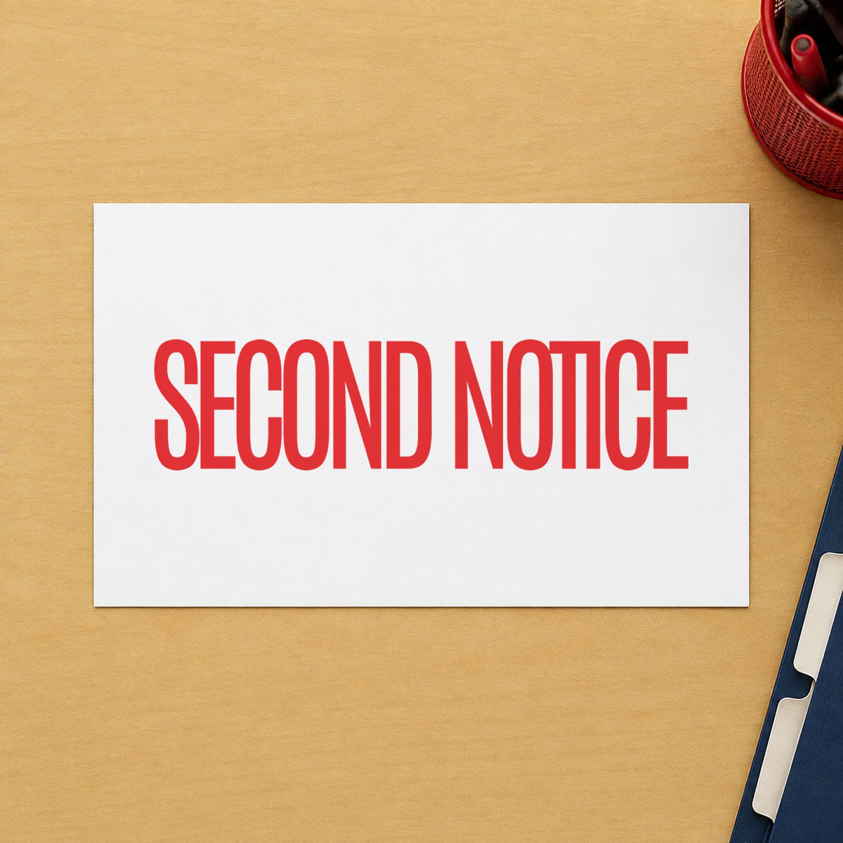 Pre-inked "Second notice" stamp marking paperwork in an office setting