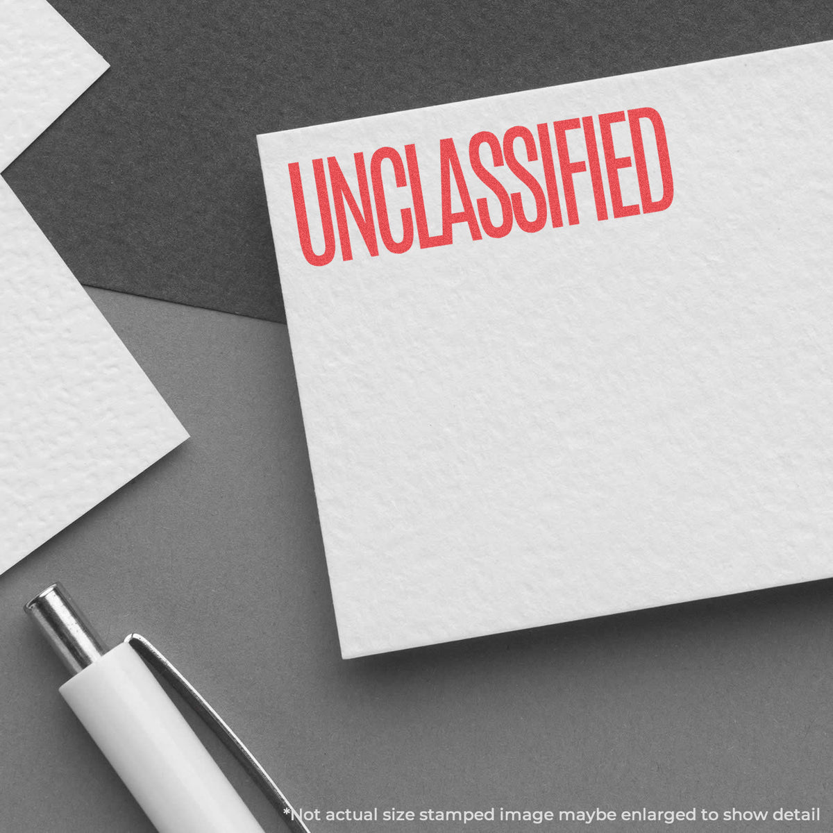 "Unclassified" pre-inked imprint on a page, rectangle shape at Approximately 1/2 in tall x 1-5/8 in wide