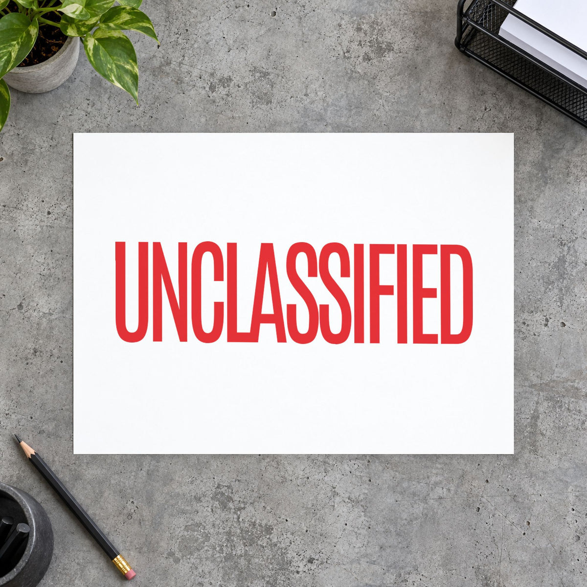 Close view of the "Unclassified" mark left by Xstamper No. 1042