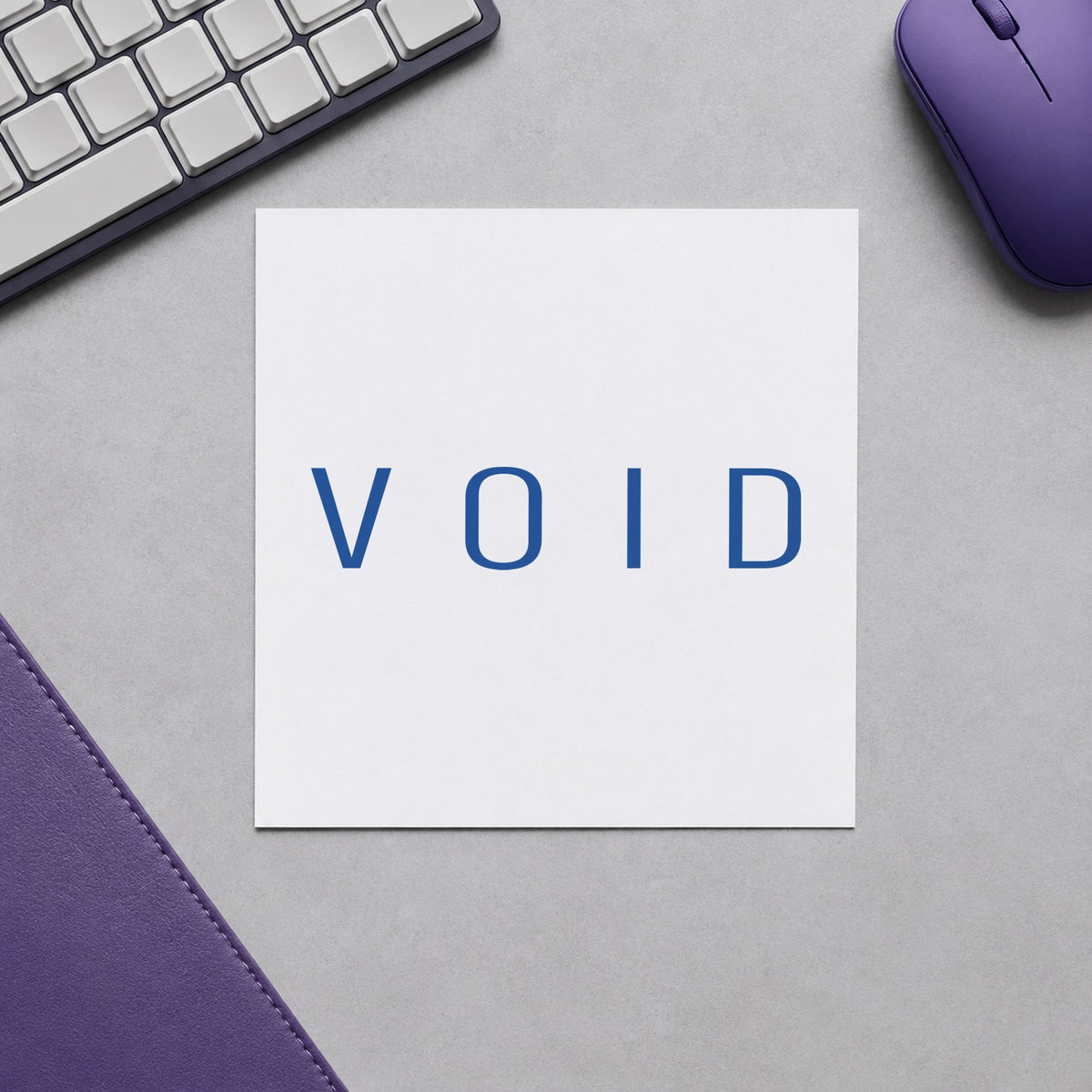 Pre-inked "Void" stamp applied to a document, Approximately 1/2 in tall x 1-5/8 in wide impression
