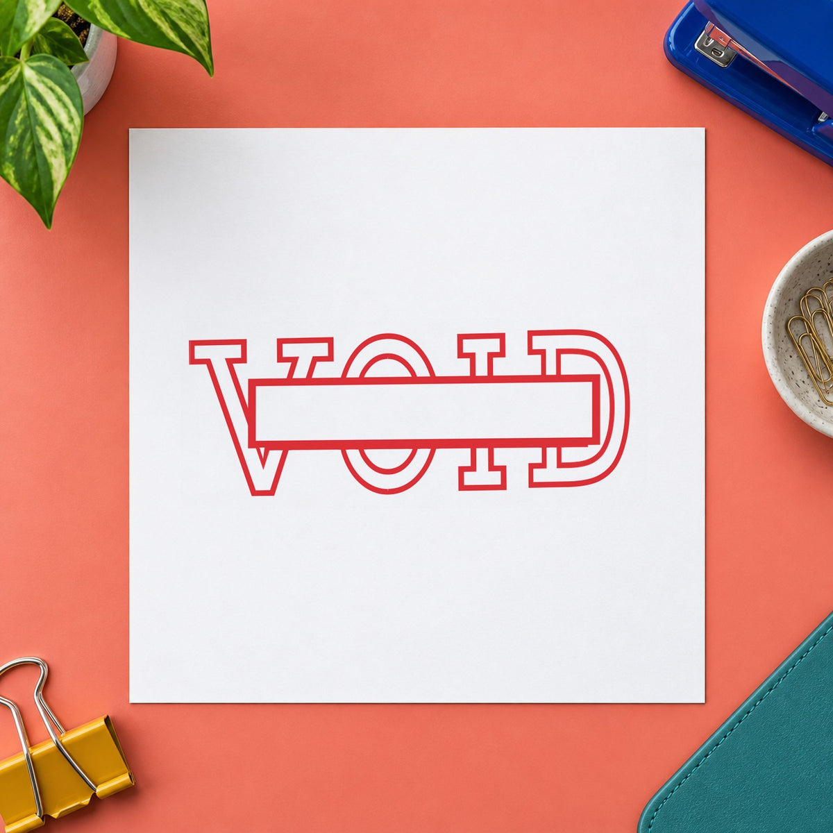 "Date void" Xstamper pre-inked stamp beside its rectangle imprint
