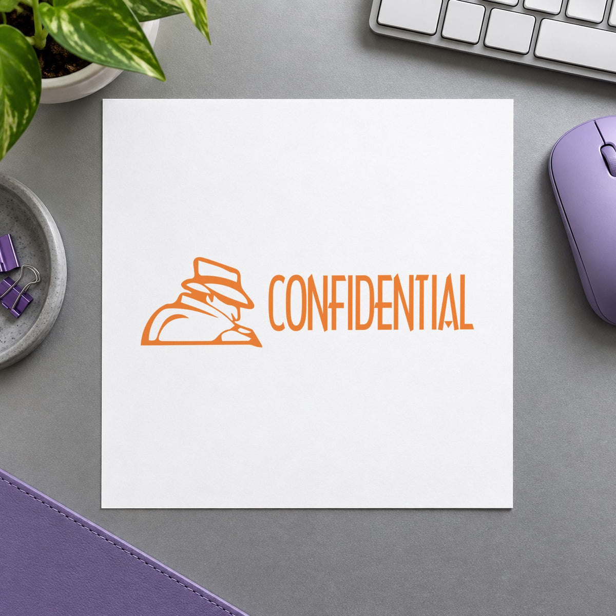 "Confidential" Xstamper pre-inked stamp beside its rectangle imprint