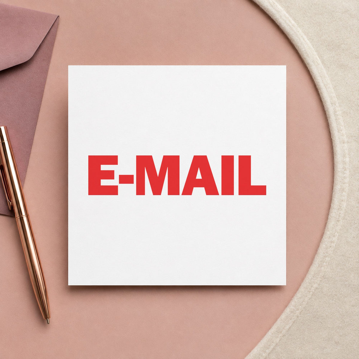 "E-mail" Xstamper stamp in use on paper, Approximately 1/2 in tall x 1-5/8 in wide rectangle imprint