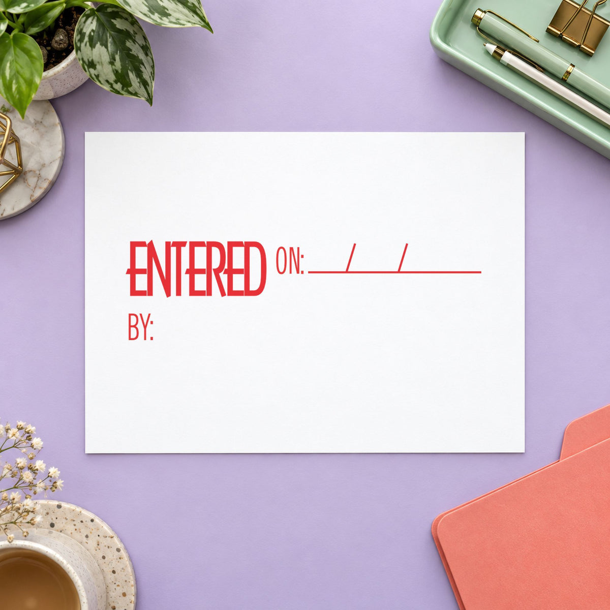 "Entered on: by:" Xstamper pre-inked stamp beside its rectangle imprint