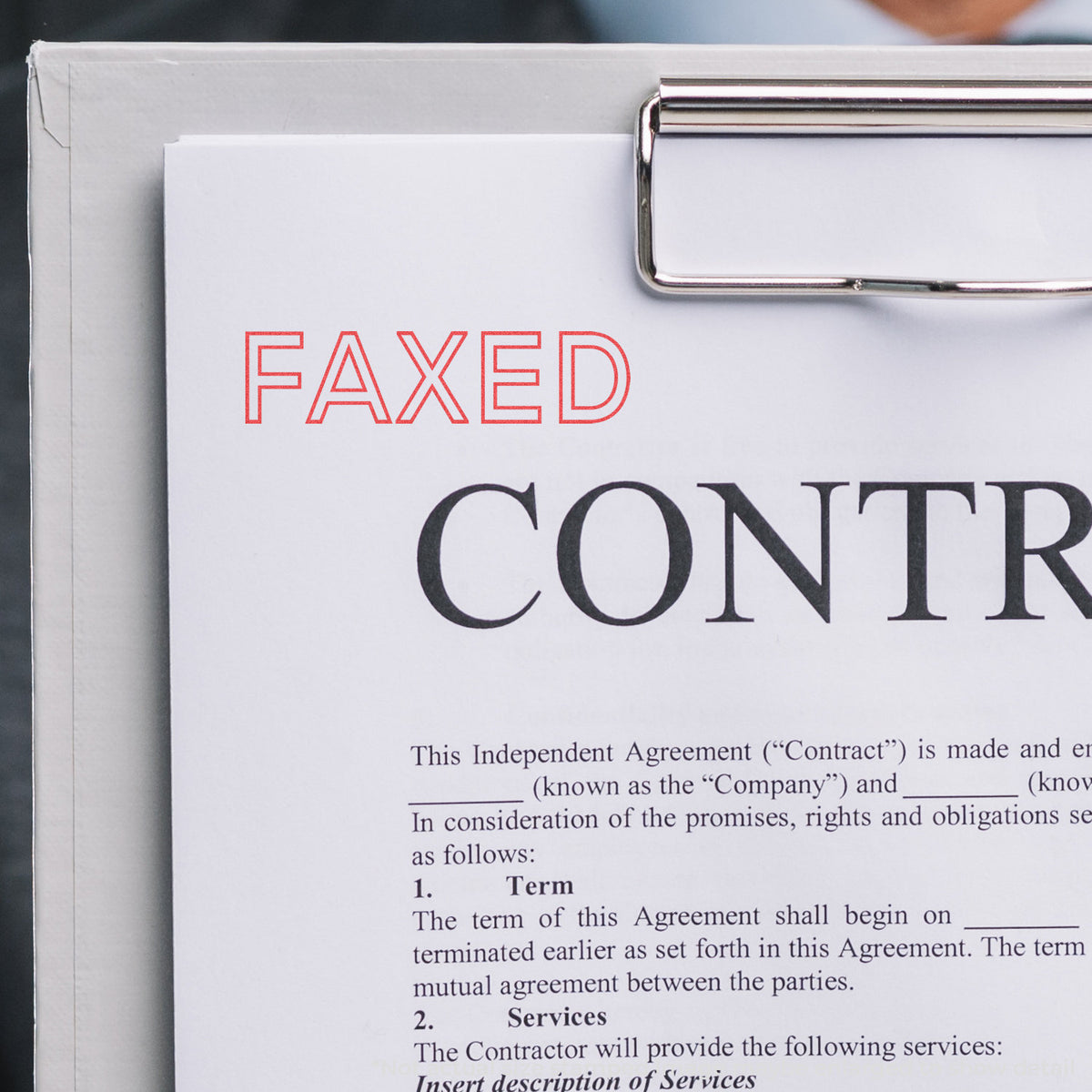 "Faxed" pre-inked imprint on a page, rectangle shape at Approximately 1/2 in tall x 1-5/8 in wide