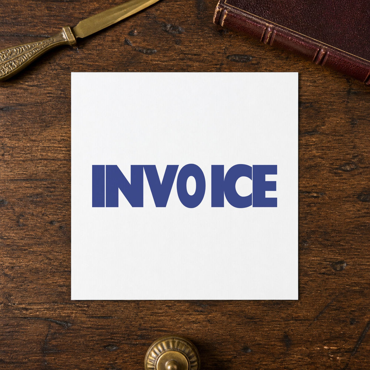 "Invoice" Xstamper stamp in use on paper, Approximately 1/2 in tall x 1-5/8 in wide rectangle imprint