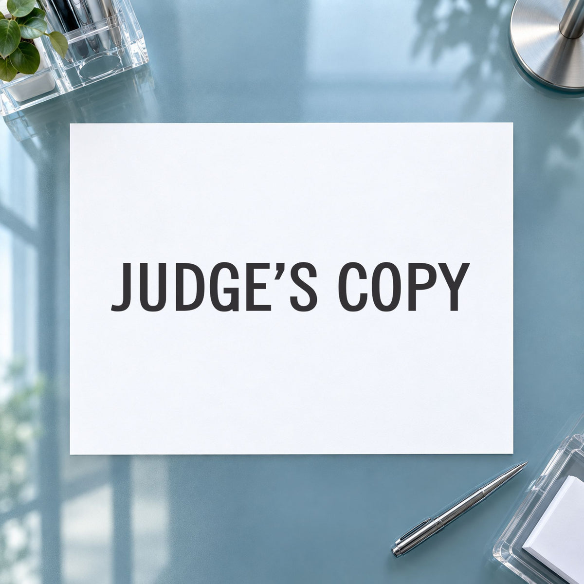 "Judge's copy" Xstamper pre-inked stamp beside its rectangle imprint