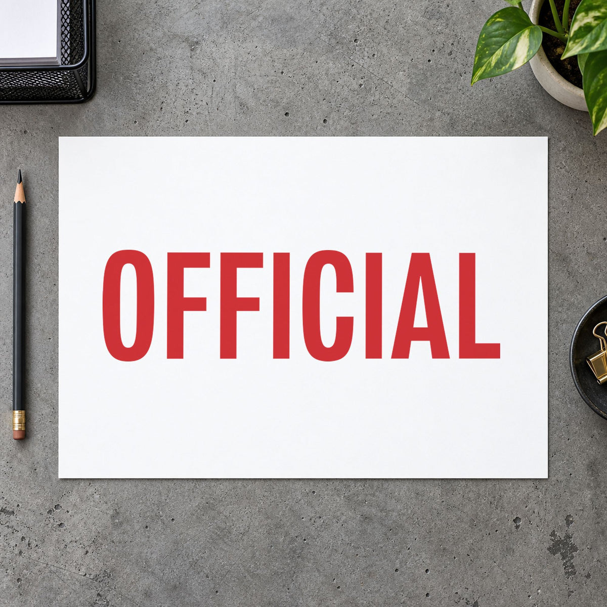 "Official" stamp pressed on paper, no separate ink pad needed