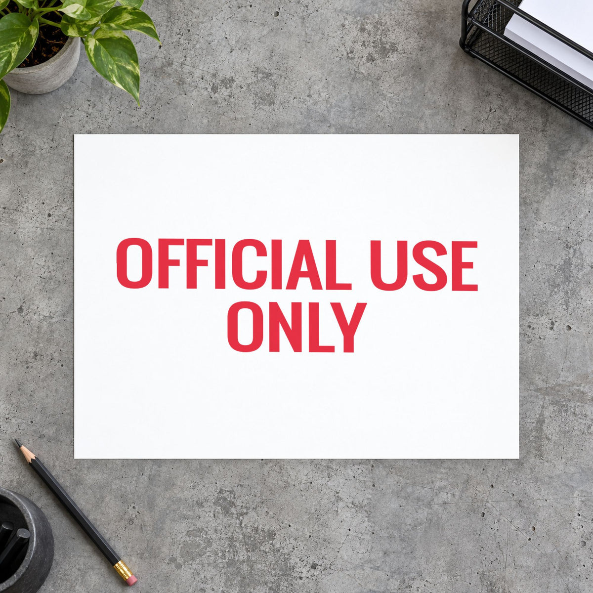 "Official use only" Xstamper stamp in use on paper, 1/2 x 1-5/8 in rectangle imprint