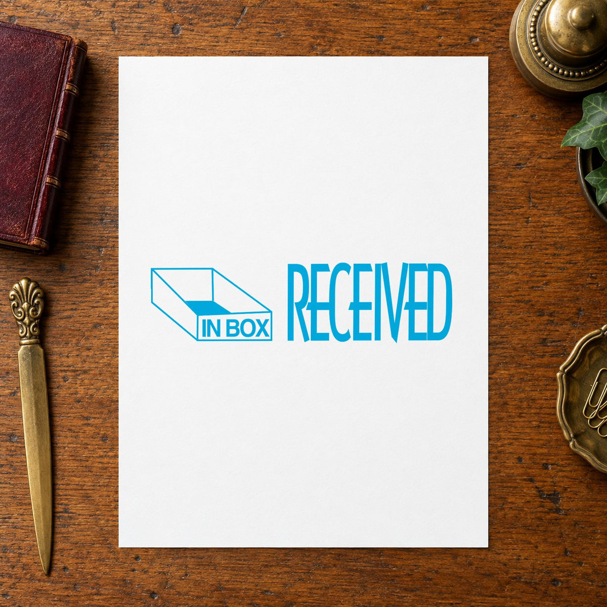 Pre-inked "Received" stamp applied to a document, Approximately 1/2 in tall x 1-5/8 in wide impression