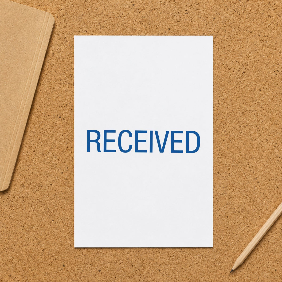 "Received" Xstamper pre-inked stamp beside its rectangle imprint