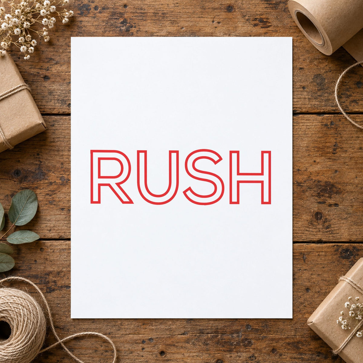 "Rush" Xstamper stamp in use on paper, Approximately 1/2 in tall x 1-5/8 in wide rectangle imprint