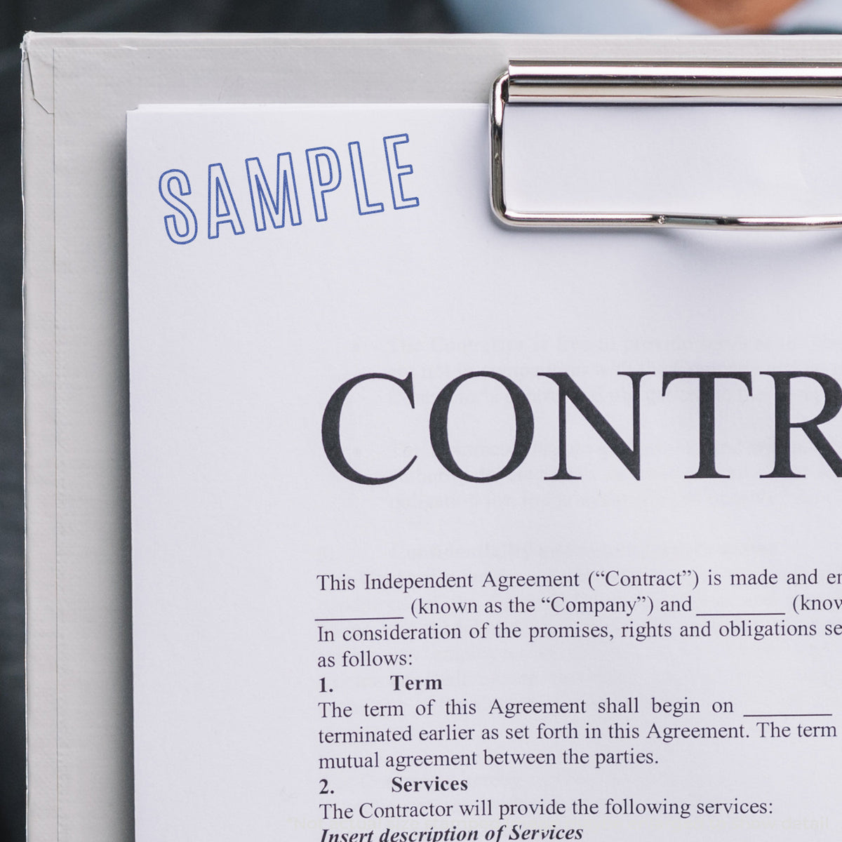 "Sample" pre-inked imprint on a page, rectangle shape at 1/2 x 1-5/8 in