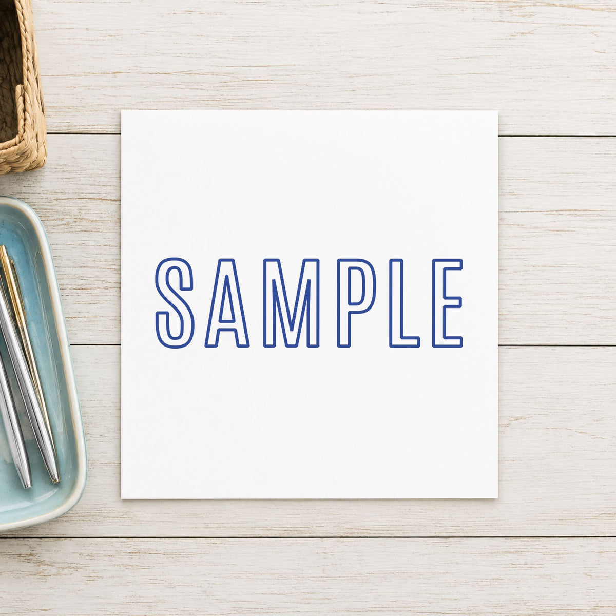 Close view of the "Sample" mark left by Xstamper No. 1002