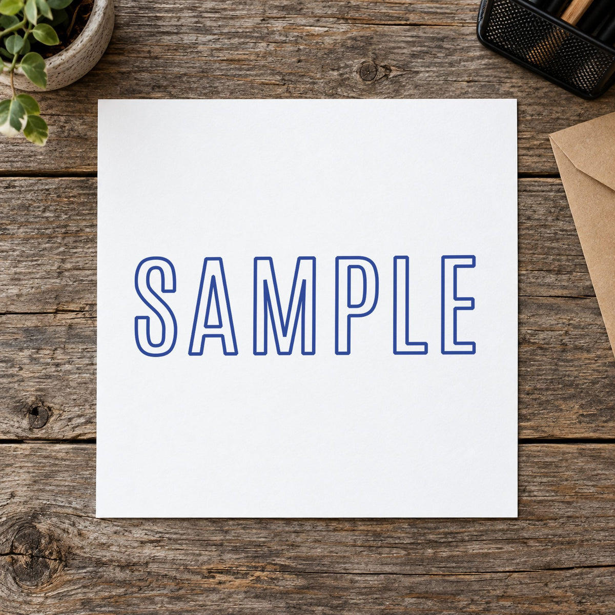 Pre-inked "Sample" stamp marking paperwork in an office setting