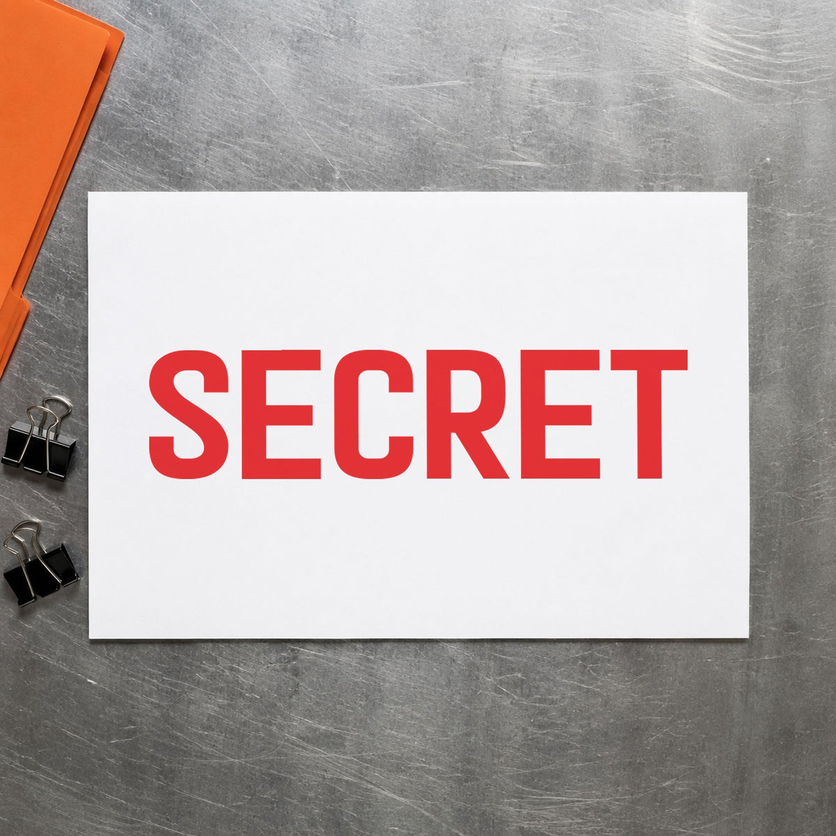 "Secret" Xstamper stamp in use on paper, 1/2 x 1-5/8 in rectangle imprint