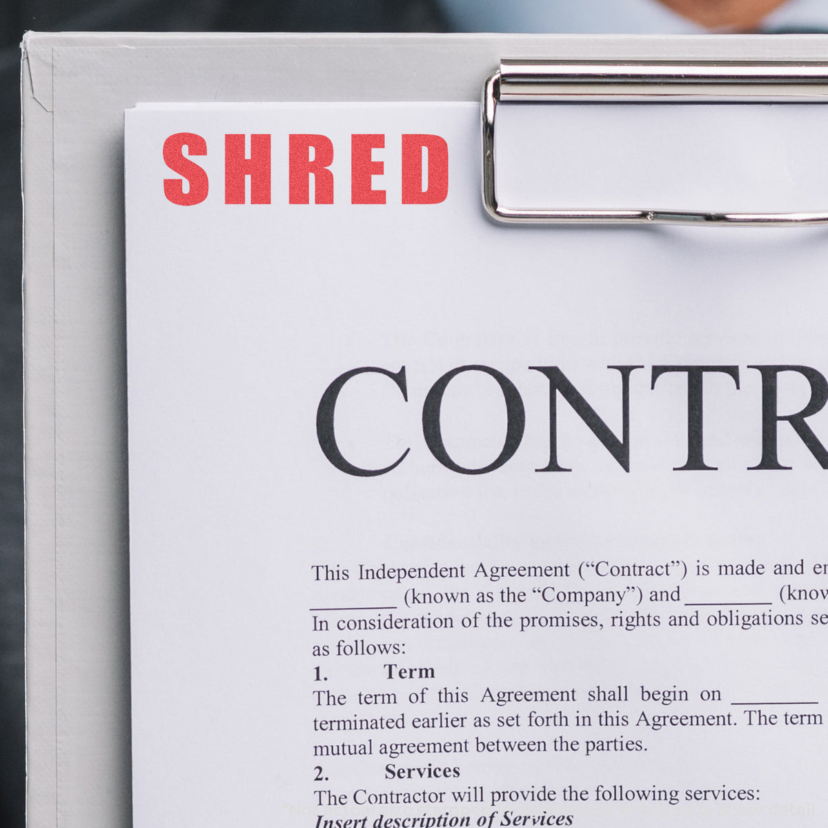 "Shred" pre-inked imprint on a page, rectangle shape at Approximately 1/2 in tall x 1-5/8 in wide