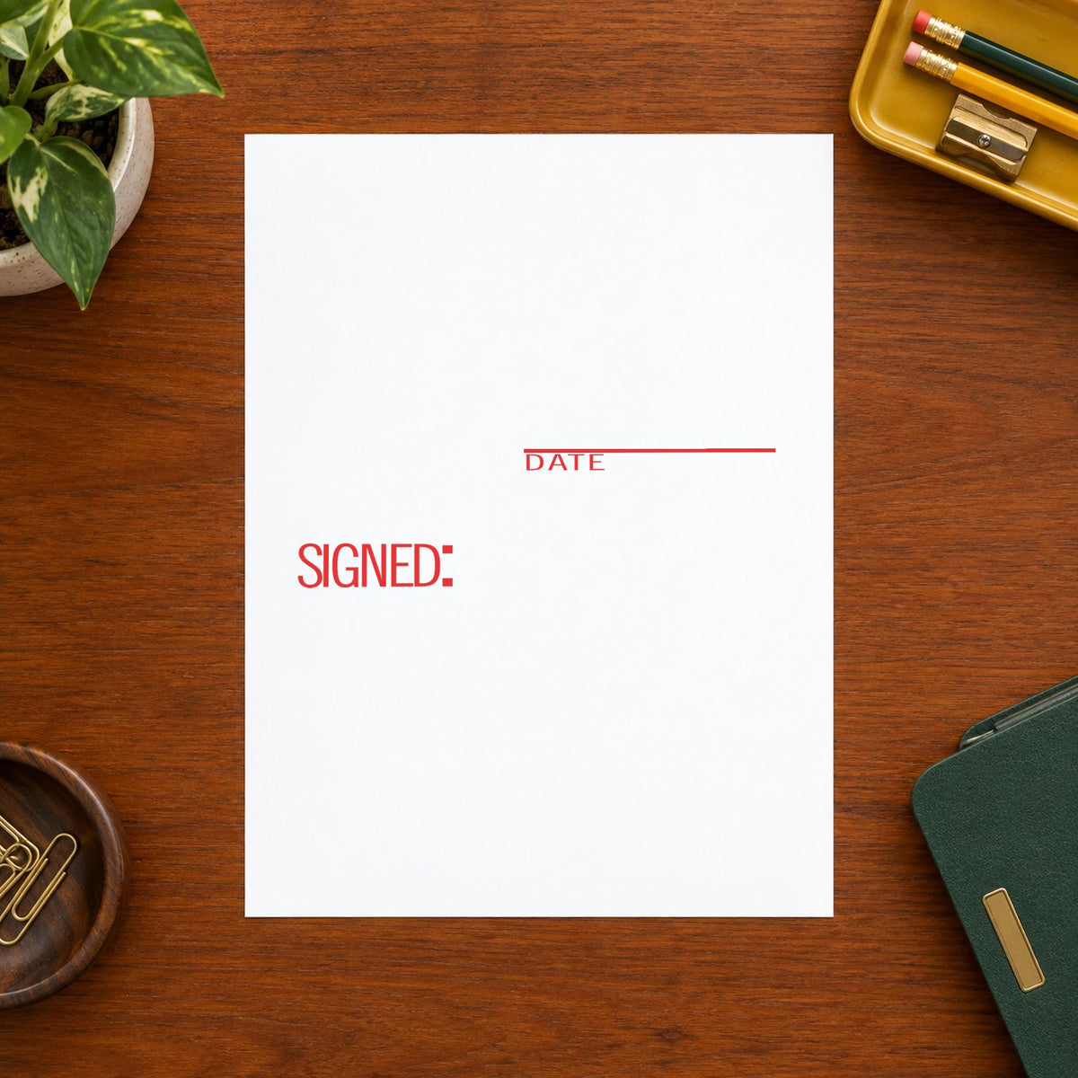 Pre-inked "Signed: date" stamp applied to a document, 1/2 x 1-5/8 in impression