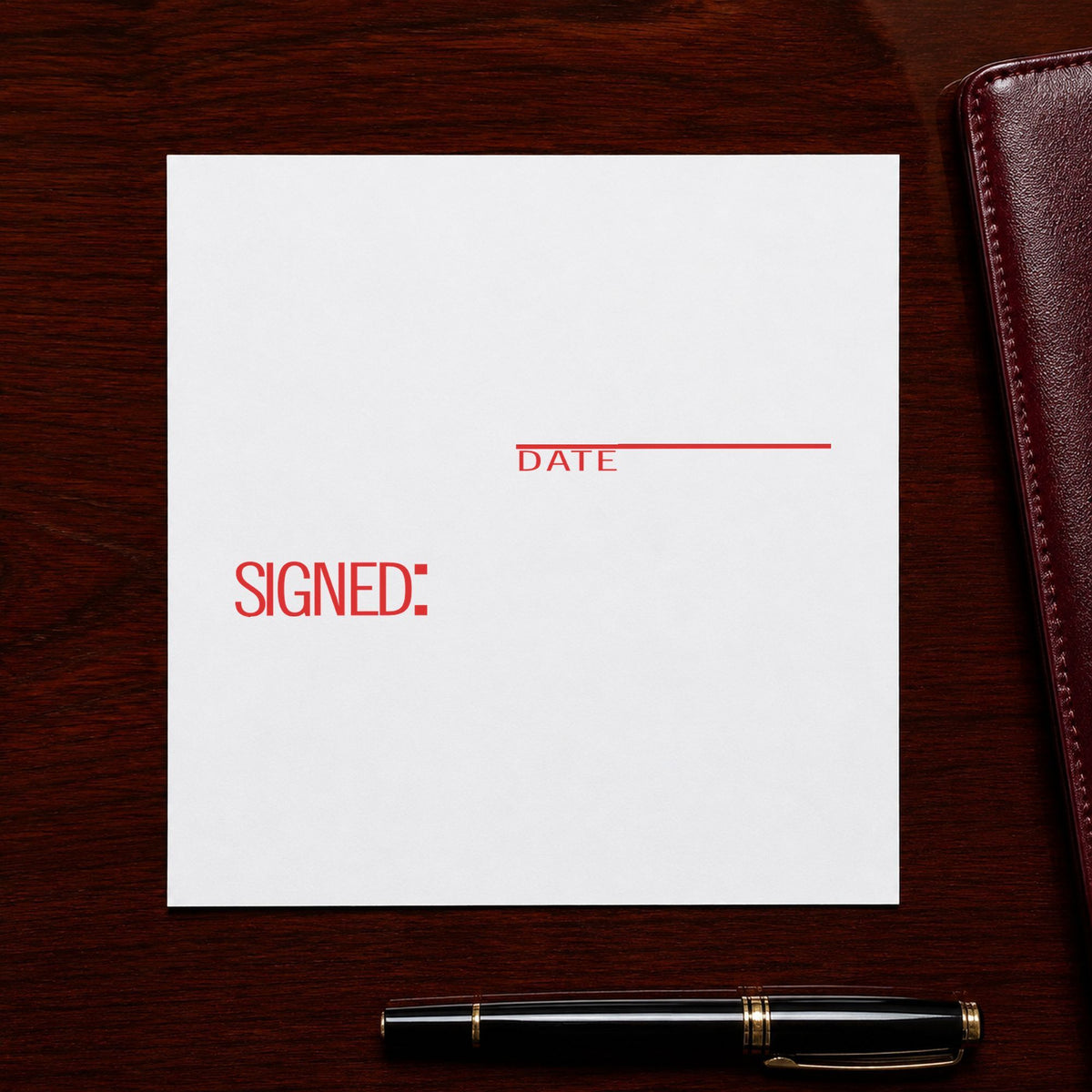 Pre-inked "Signed: date" stamp marking paperwork in an office setting