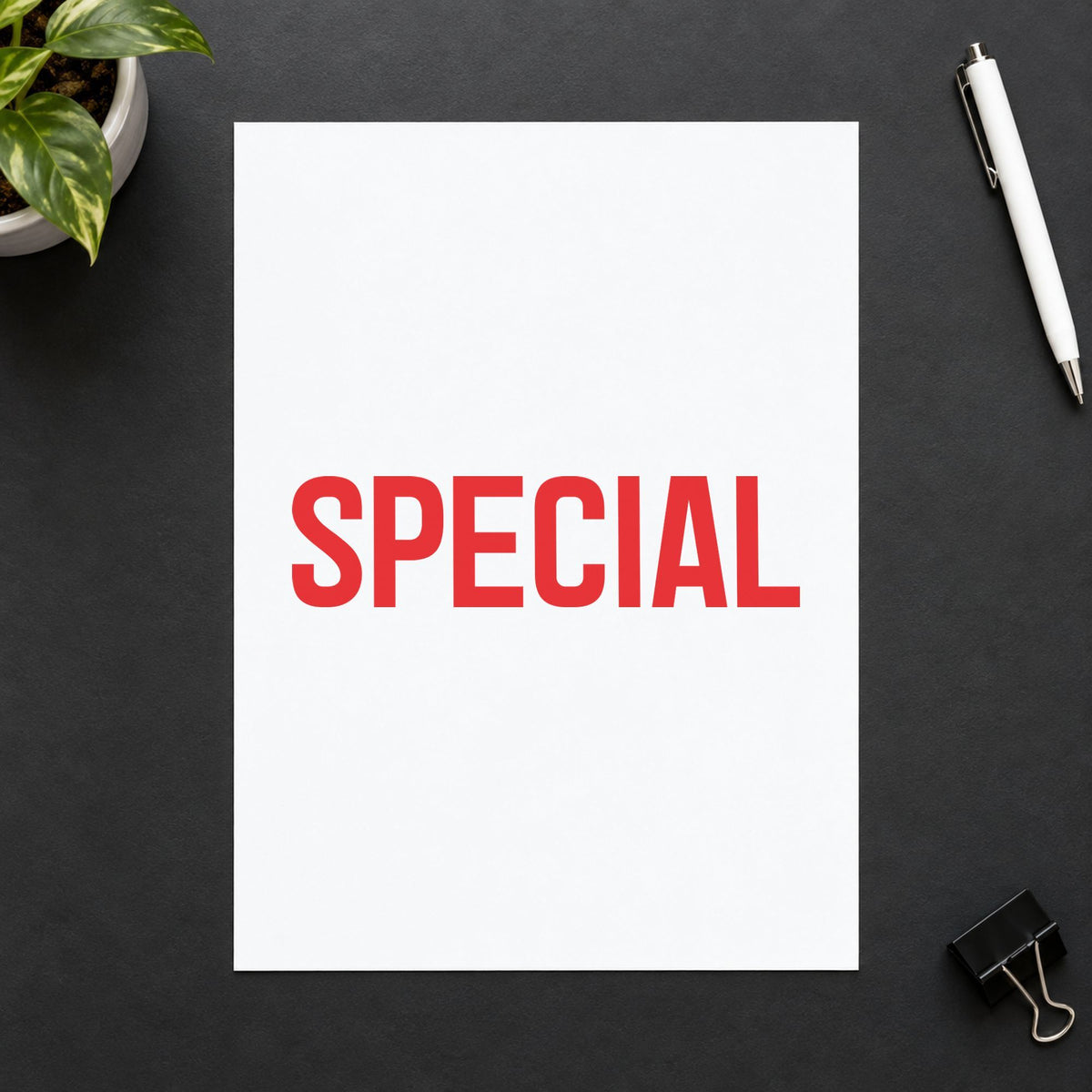 "Special" stamp pressed on paper, no separate ink pad needed