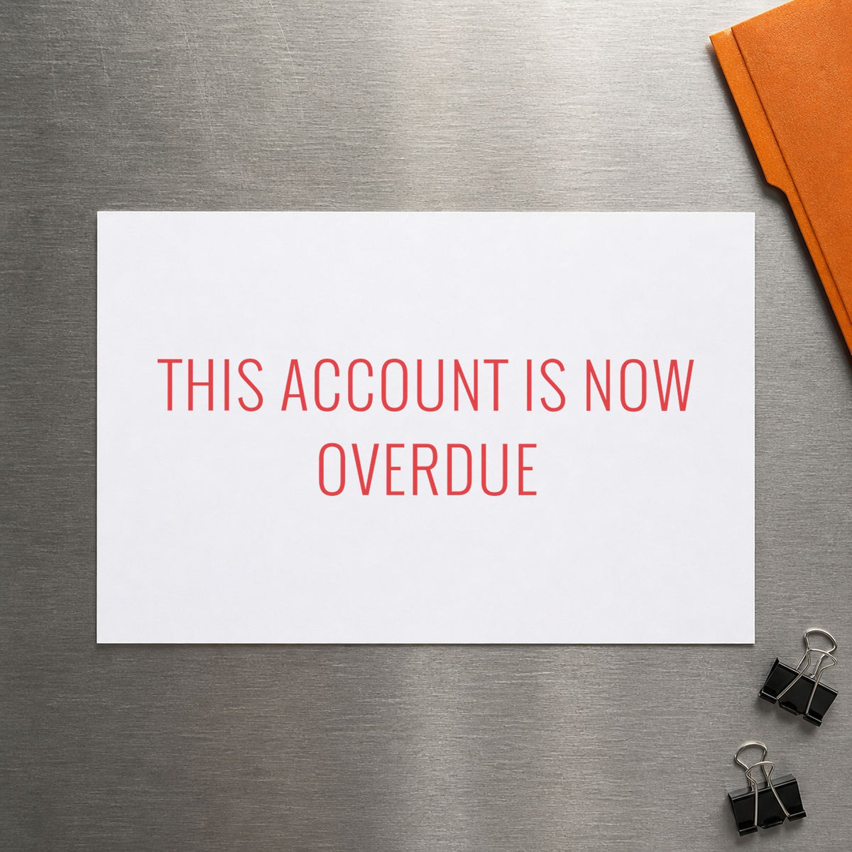 "This account is now overdue" Xstamper stamp at work on everyday office paperwork