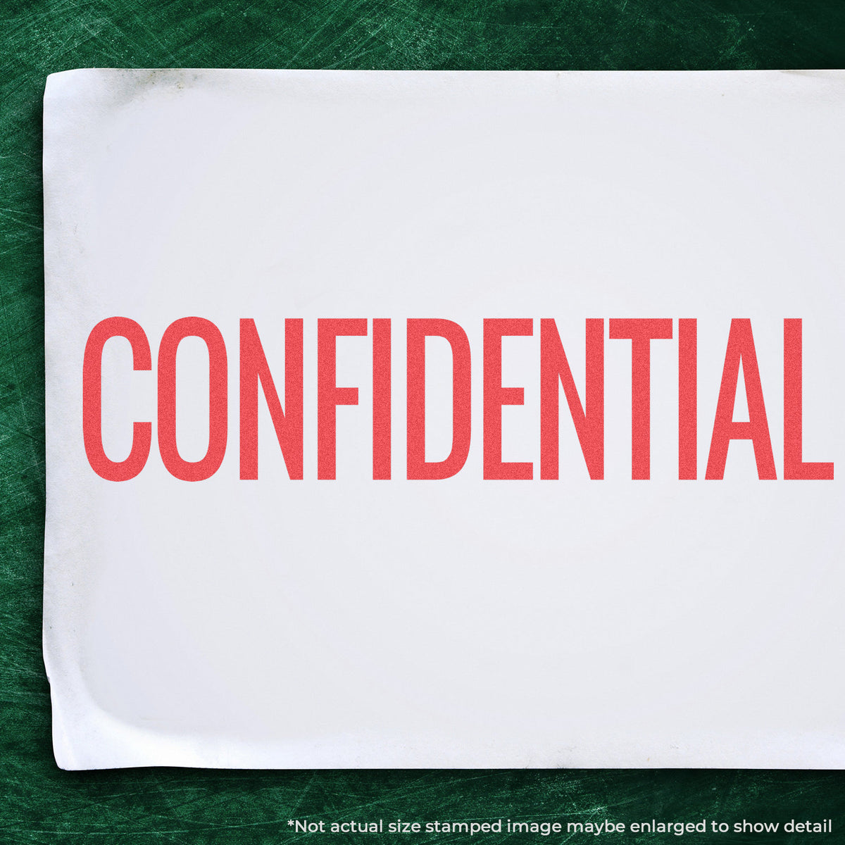 "Confidential" stamp and its crisp Approximately 7/8 in tall x 2-3/4 in wide impression on paper