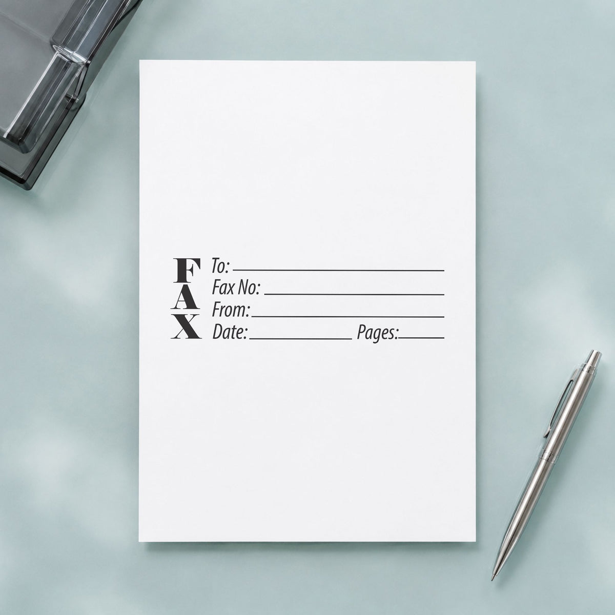 "Fax stamp" Xstamper pre-inked stamp beside its rectangle imprint