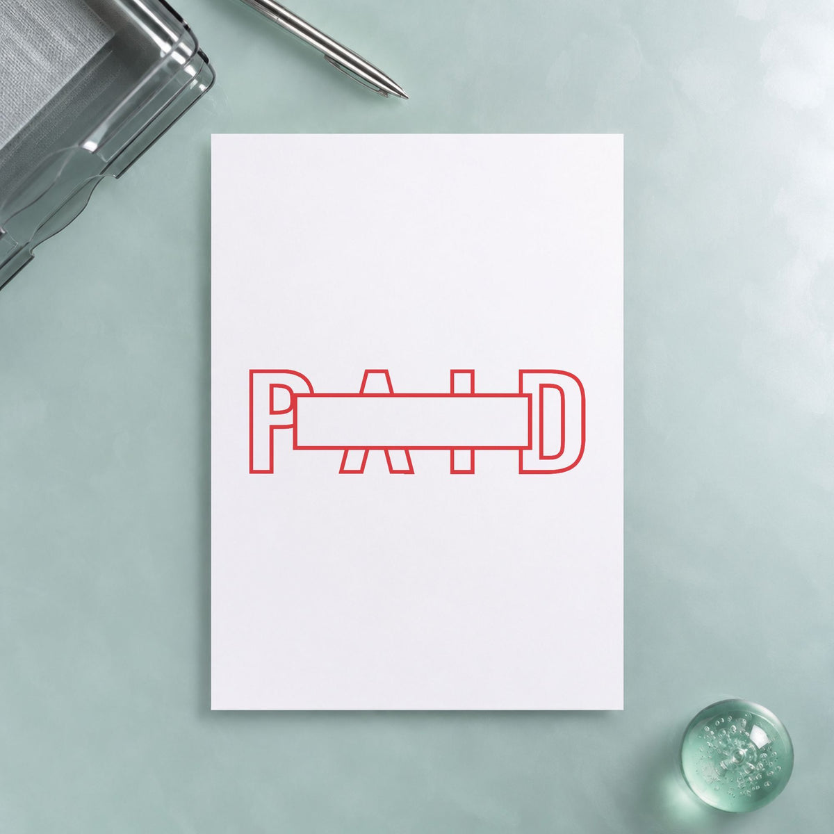 "Paid" imprint on a printed page, Xstamper No. 3231