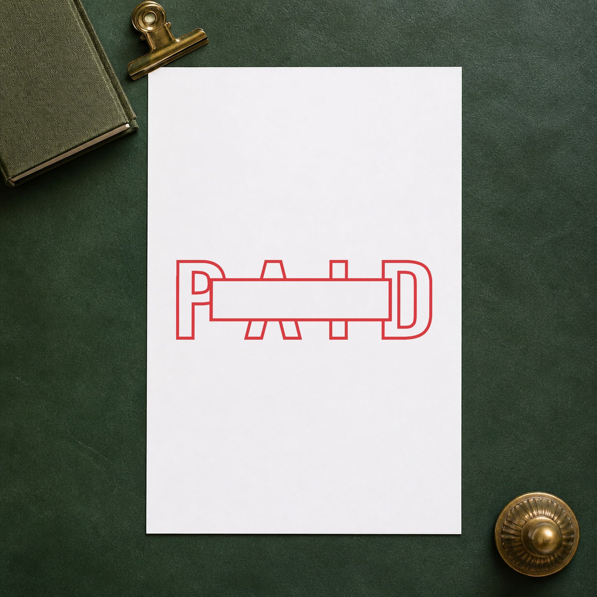 "Paid" Xstamper pre-inked stamp beside its rectangle imprint