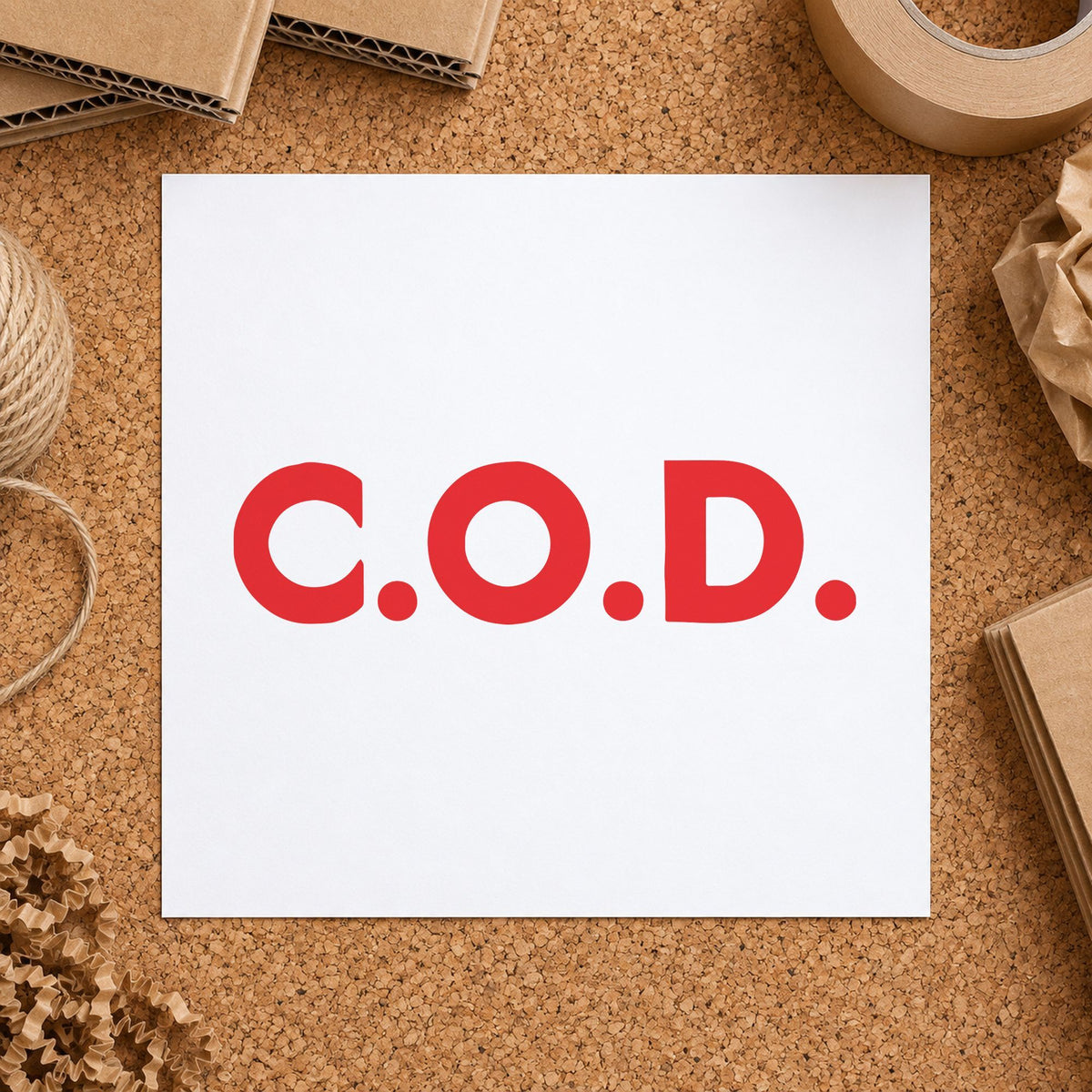 "C.O.D." Xstamper pre-inked stamp beside its rectangle imprint