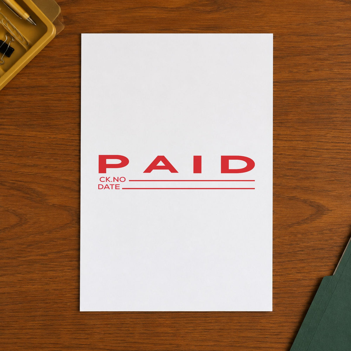 "Paid CK No.-Date" Xstamper stamp in use on paper, Approximately 7/8 in tall x 2-3/4 in wide rectangle imprint