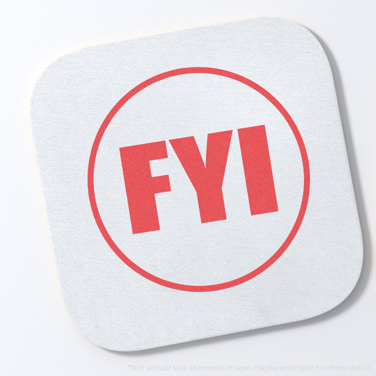"FYI" stamp and its crisp 5/8 in diameter impression on paper