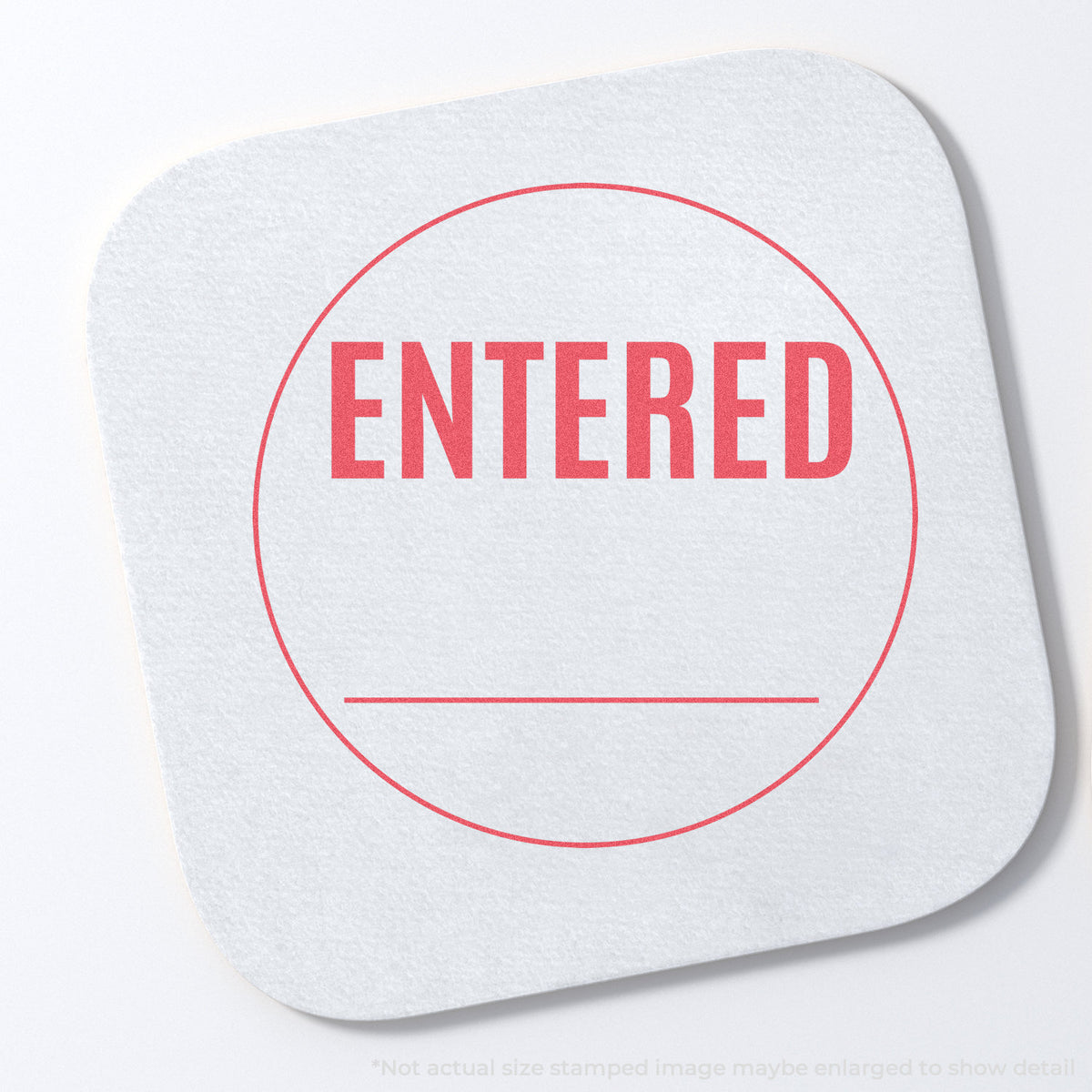 "Entered" stamp and its crisp Approximately 5/8 in diameter impression on paper
