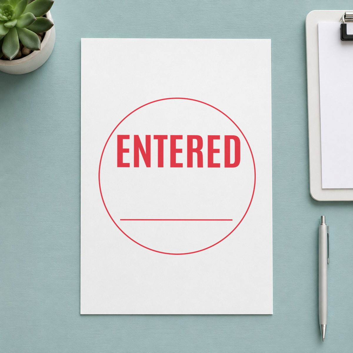 "Entered" imprint on a printed page, Xstamper No. 11418