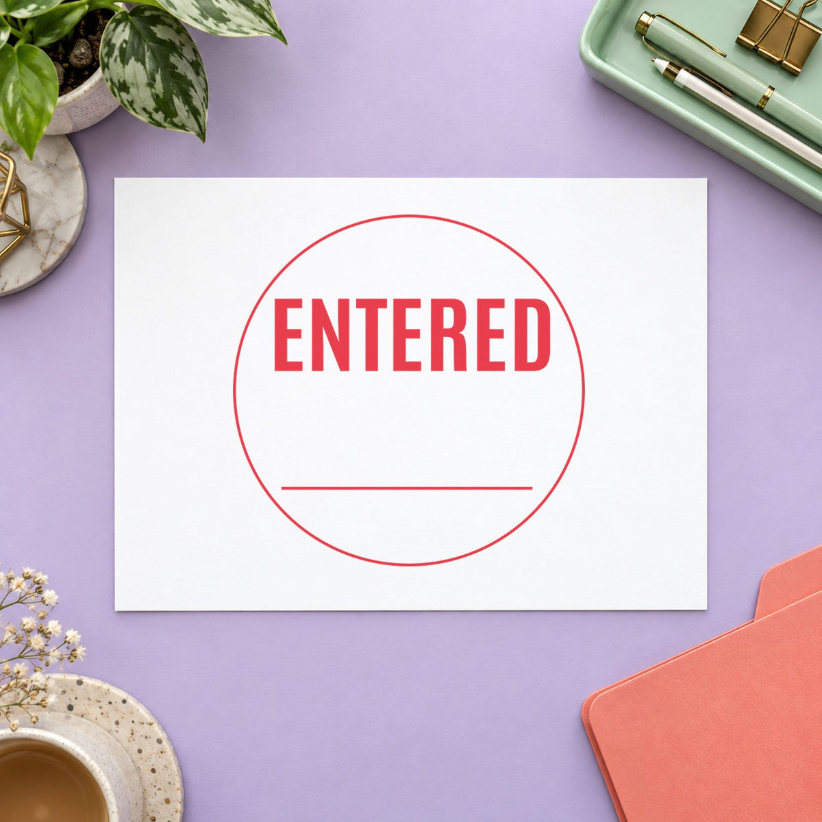 "Entered" stamp pressed on paper, no separate ink pad needed