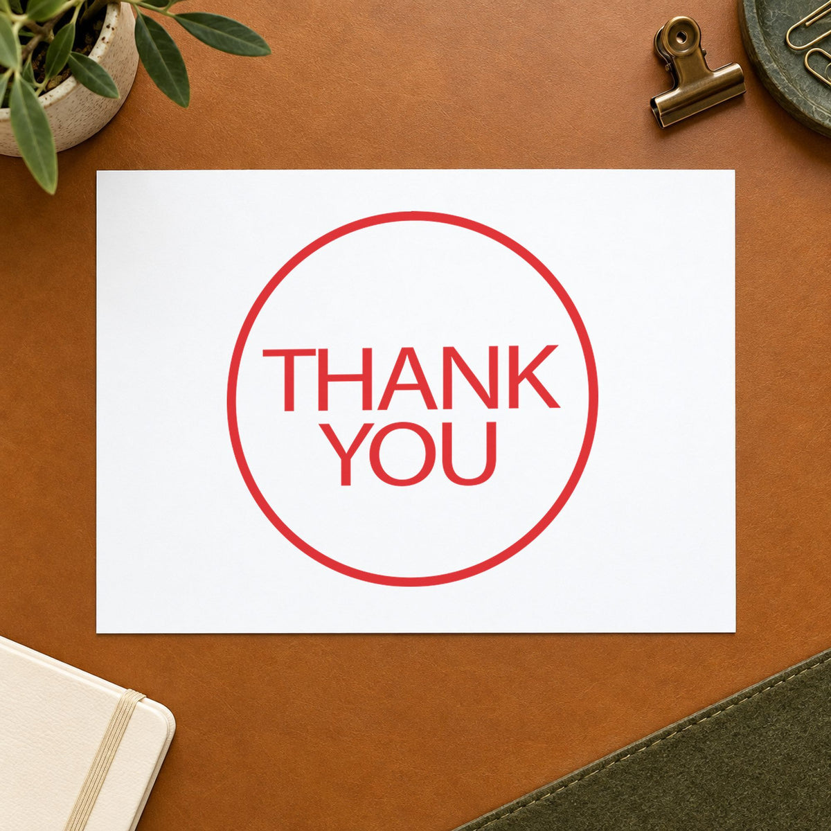 "Thank you" stamp pressed on paper, no separate ink pad needed