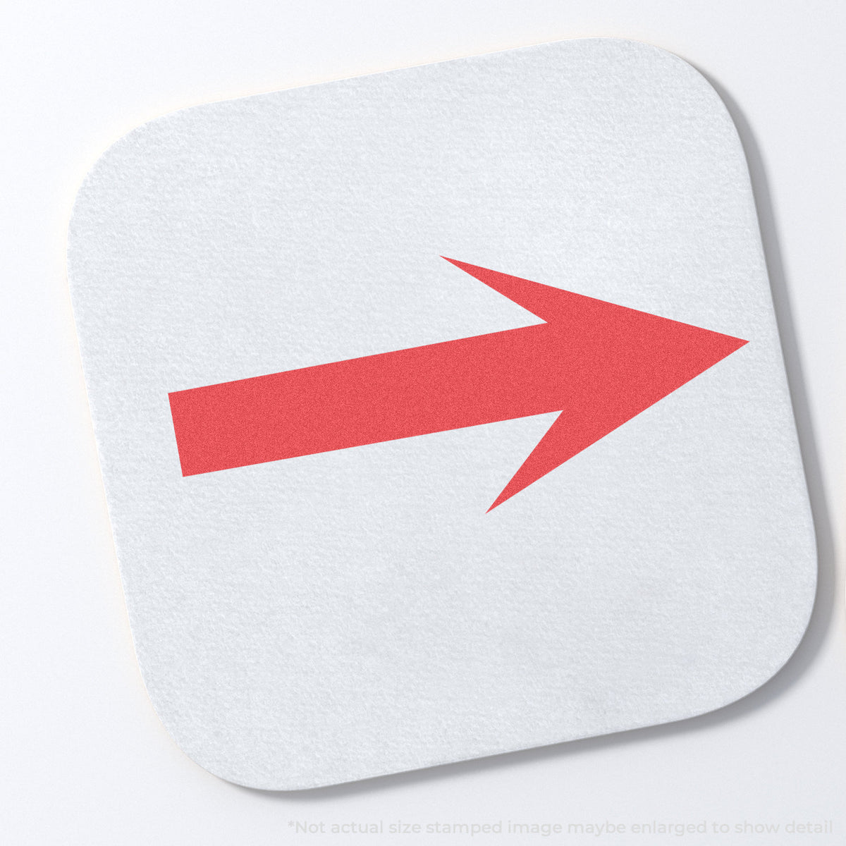 "Arrow" stamp and its crisp 5/8 in diameter impression on paper