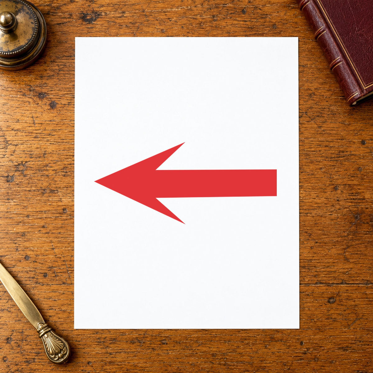 "Arrow" Xstamper pre-inked stamp beside its round imprint