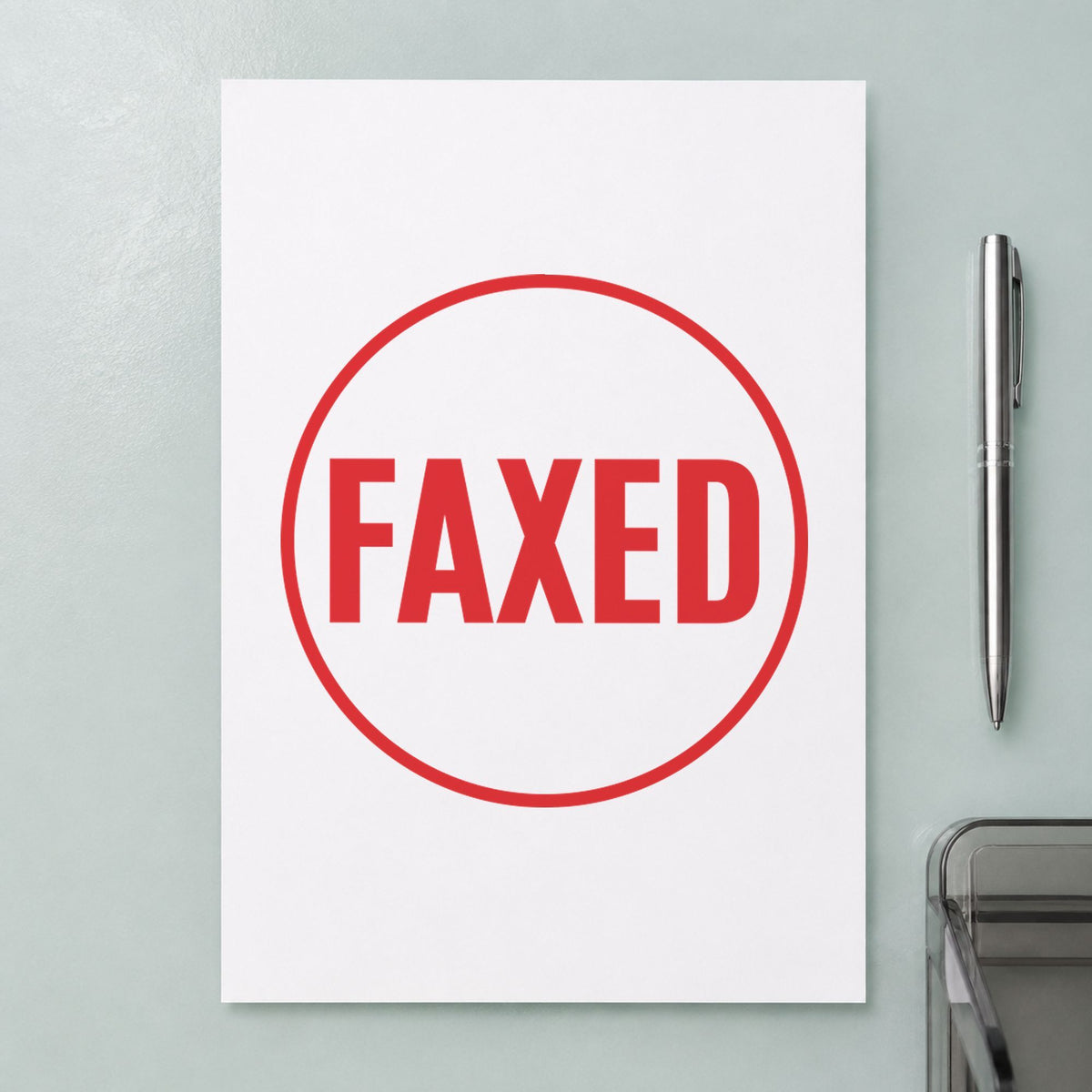 "Faxed" Xstamper No. 11409 stamp shown in everyday handling