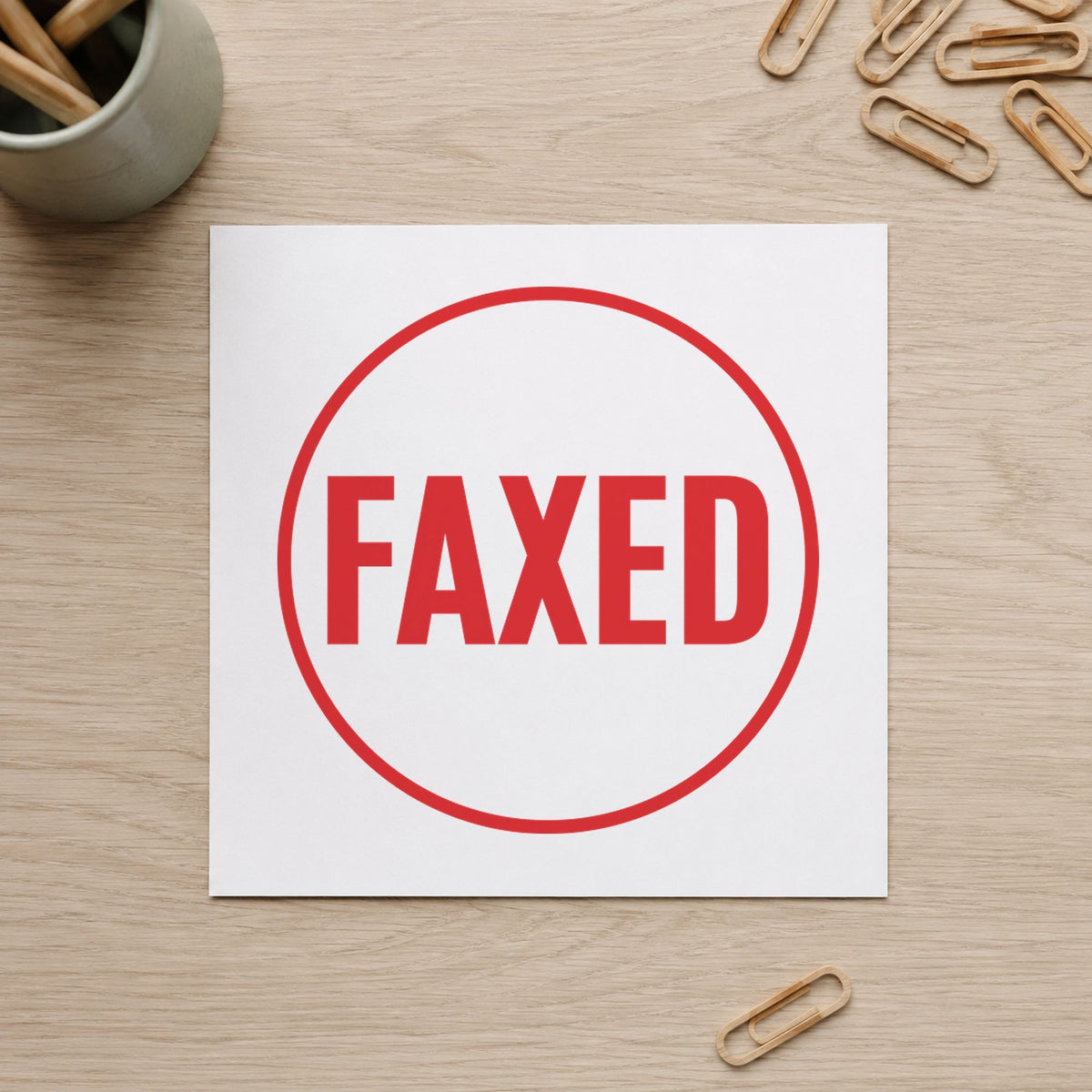 "Faxed" imprint on a printed page, Xstamper No. 11409